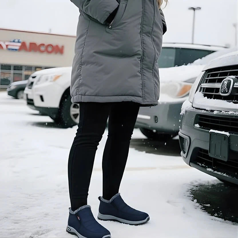 Sianna-laarsjes in de sneeuw