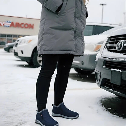 Sianna-laarsjes in de sneeuw